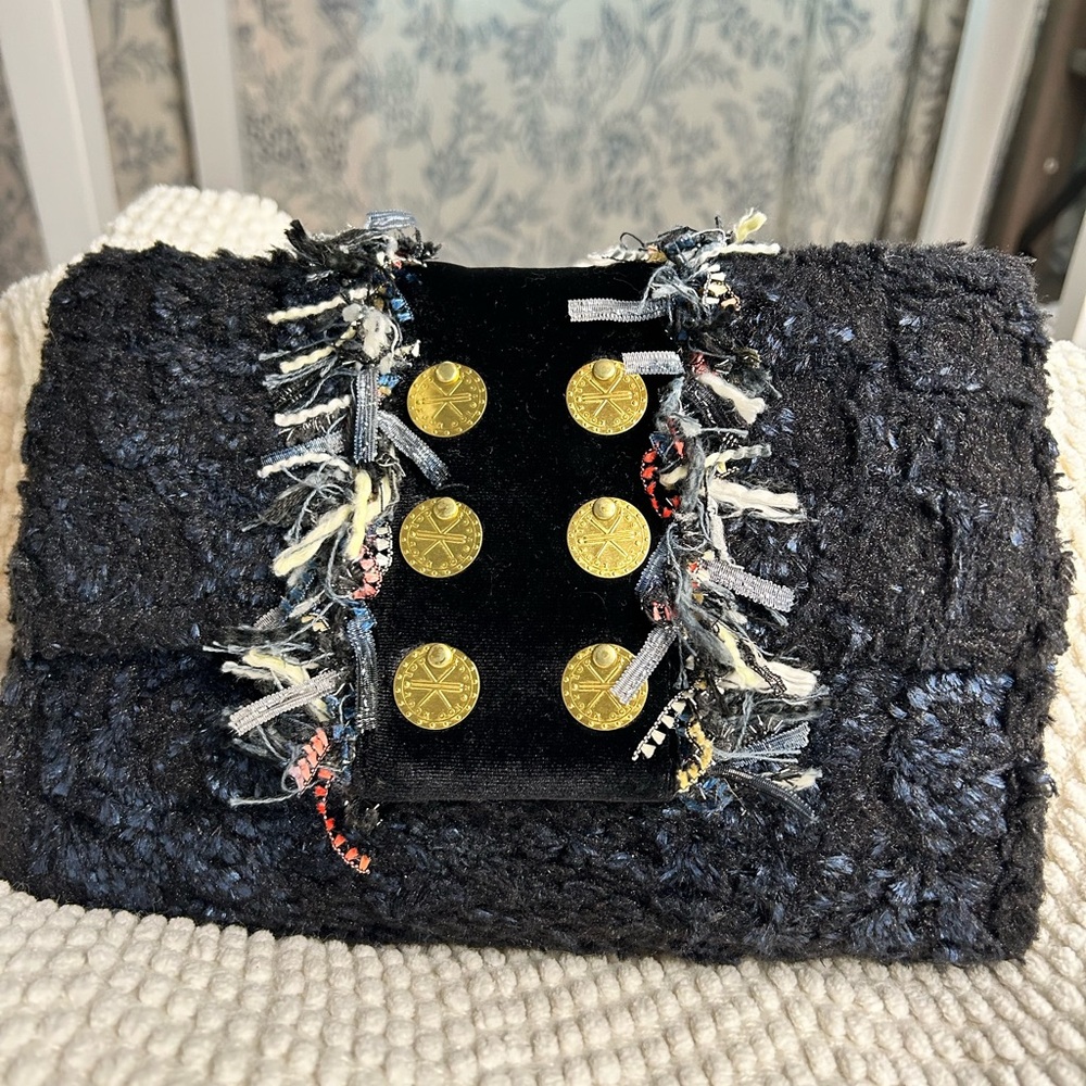 Kooreloo $400 retail Metallic Blue Titlis Clutch.